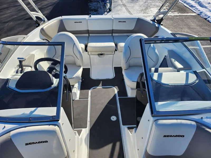 Slide: The Image of 2012 Sea-Doo 180 Challenger SE interior with seating and steering wheel. - 18