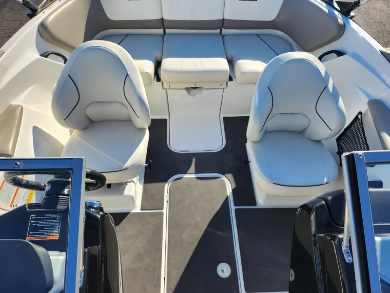 Slide: The Image of 2012 Sea-Doo 180 Challenger SE interior with seating and dashboard view. - 19