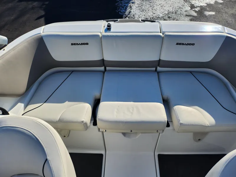 Slide: The Image of 2012 Sea-Doo 180 Challenger SE boat interior with white seating. - 20