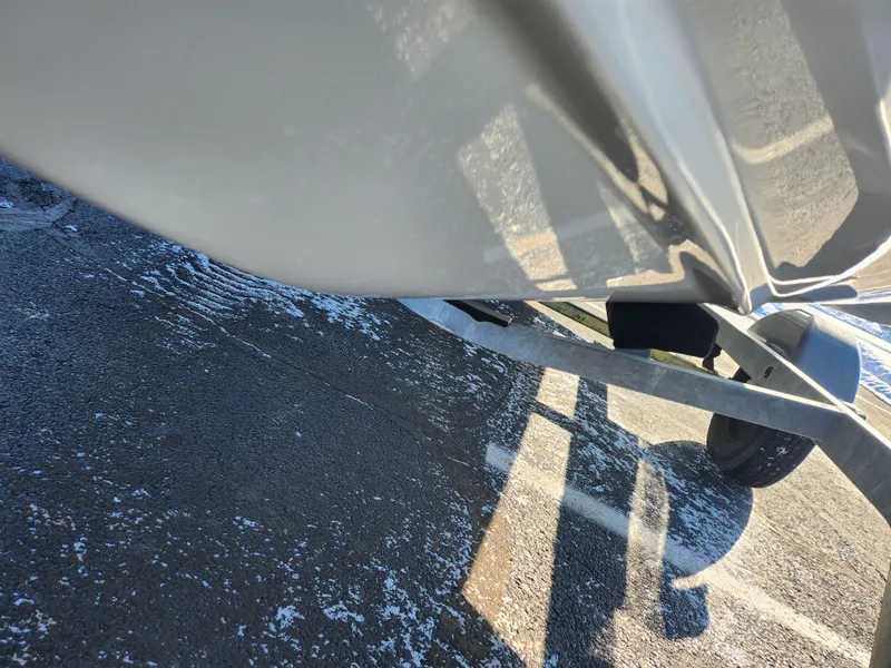 Slide: The Image of 2012 Sea-Doo 180 Challenger SE boat on trailer, close-up view. - 7