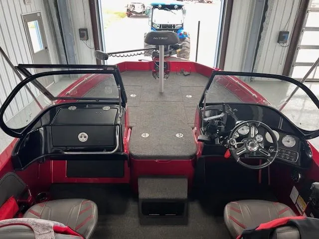 Slide: The Image of 2020 Nitro ZV19 Pro boat interior with steering wheel and seating. - 7