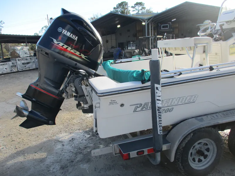 Slide: The Image of 2011 Pathfinder 2200 XL boat with Yamaha outboard motor on trailer. - 3