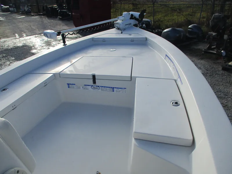 Slide: The Image of 2011 Pathfinder 2200 XL boat deck with storage compartments and trolling motor. - 6