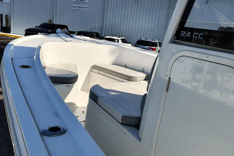 Slide: The Image of 2024 Parker 2900 Center Console boat interior with seating and storage. - 2
