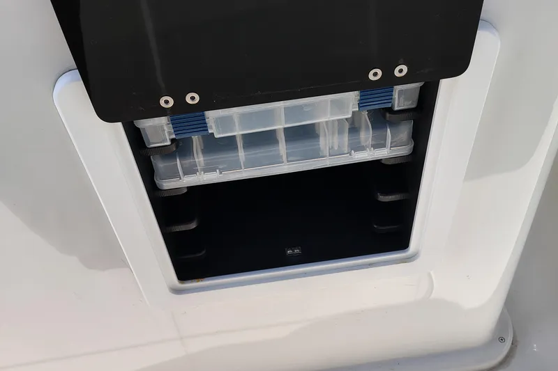 Slide: The Image of 2024 Parker 2900 Center Console storage compartment detail. - 21