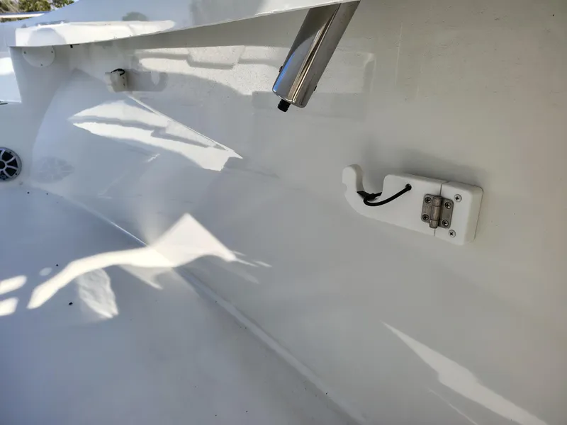 Slide: The Image of 2024 Parker 2900 Center Console boat interior detail with white finish and mounted hardware. - 9