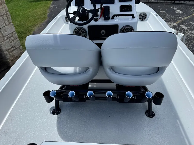 Slide: The Image of 2025 SCB S22 boat interior with dual seats and rod holders. - 11