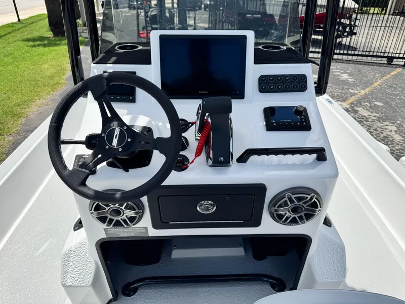 Slide: The Image of 2025 SCB S22 boat console with steering wheel, touchscreen, and controls. - 15