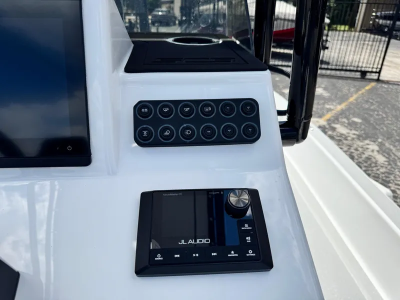 Slide: The Image of Control panel of SCB S22 boat, featuring JL Audio system, 2025 model. - 16