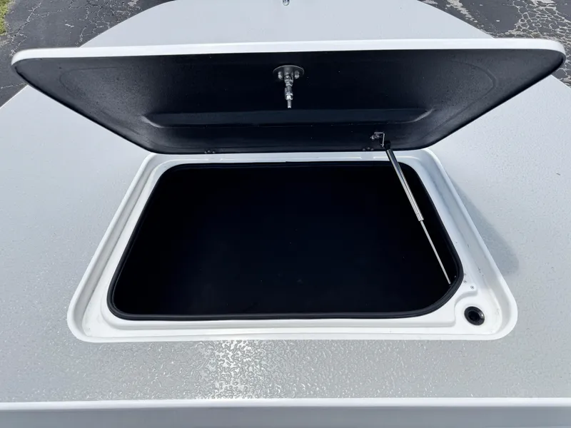 Slide: The Image of Open storage compartment on 2025 SCB S22 boat. - 30