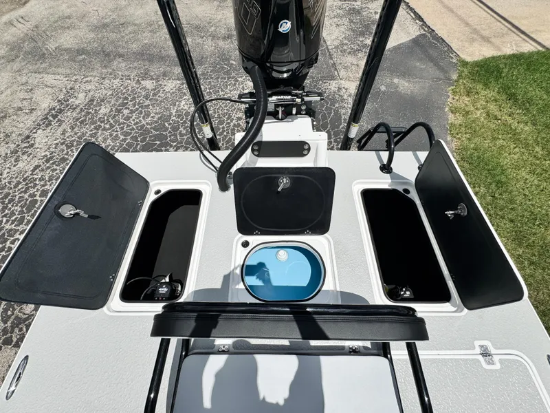 Slide: The Image of 2025 SCB S22 boat deck with storage compartments and motor. - 8