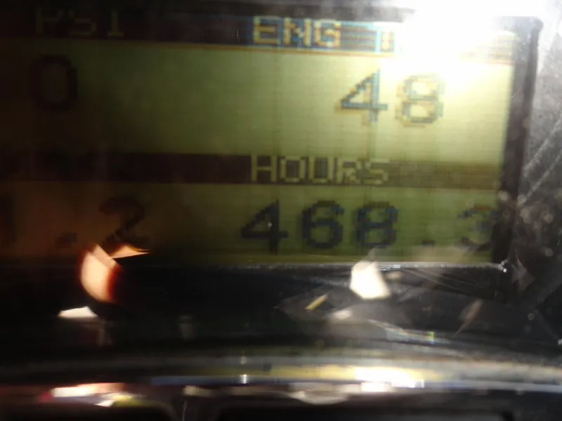 Slide: The Image of Close-up of Axis A22 2016 engine hours display showing 468.3 hours. - 14