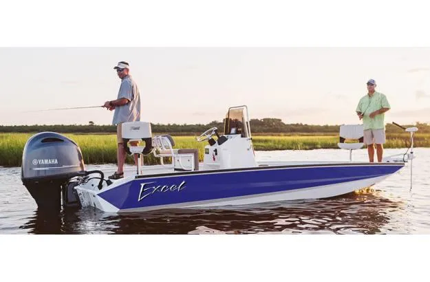 Slide: The Image of 2022 Excel Bay Pro 203 boat with Yamaha engine, two people fishing in calm waters. - 20