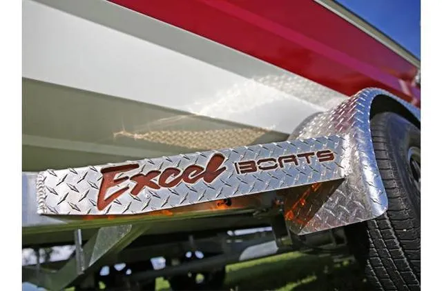 Slide: The Image of 2022 Excel Bay Pro 203 boat trailer with metallic branding detail. - 32
