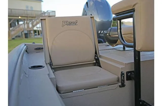 Slide: The Image of 2022 Excel Bay Pro 203 boat seat with motor in background. - 38