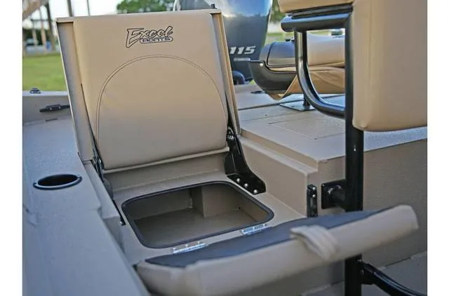 Slide: The Image of 2022 Excel Bay Pro 203 boat seat with storage compartment open. - 39