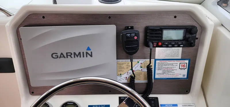 Slide: The Image of Control panel of 2016 World Cat 2780 Glacier Bay Edition with Garmin navigation system. - 20