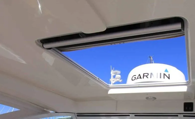 Slide: The Image of 2016 World Cat 2780 Glacier Bay Edition boat with Garmin radar through sunroof. - 31