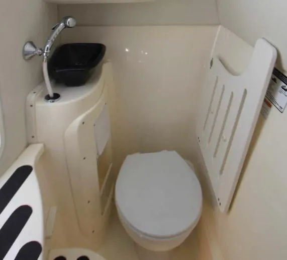 Slide: The Image of Compact bathroom in 2016 World Cat 2780 Glacier Bay Edition boat. - 40