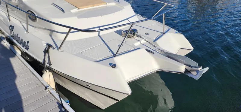 Slide: The Image of 2016 World Cat 2780 Glacier Bay Edition boat docked on calm water. - 7
