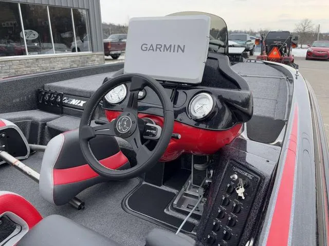 Slide: The Image of Interior of 2025 Phoenix 921 ELITE boat with Garmin navigation system. - 6