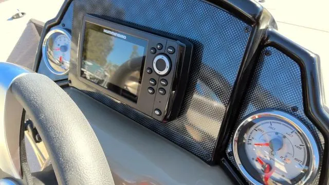 Slide: The Image of Dashboard of 2025 G3 Sportsman 1610 boat with gauges and electronic display. - 10