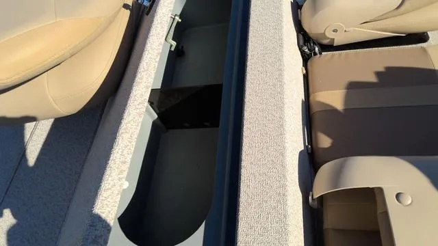Slide: The Image of 2025 G3 Sportsman 1610 boat interior with storage compartment and seating. - 12