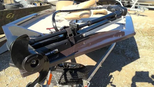 Slide: The Image of 2025 G3 Sportsman 1610 boat with Minn Kota trolling motor on trailer. - 8