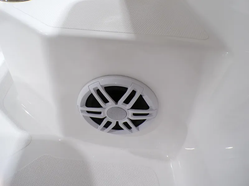 Slide: The Image of 2024 NauticStar 231 Hybrid boat speaker detail in white interior. - 36