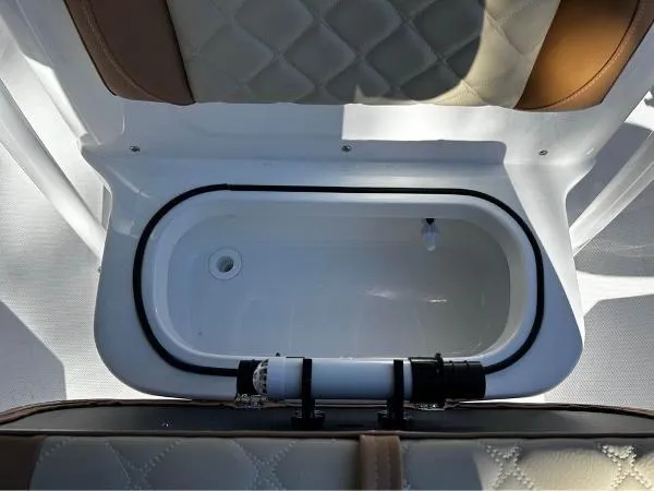 Slide: The Image of 2024 NauticStar 231 Hybrid boat livewell with cushioned seating. - 39
