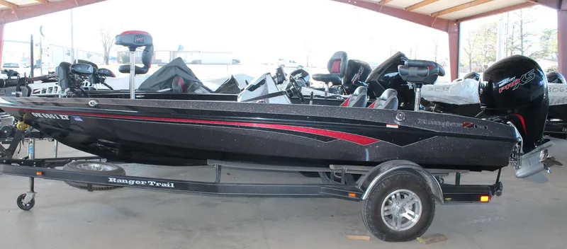 Slide: The Image of 2020 Ranger Z185 boat on trailer in covered storage area. - 1