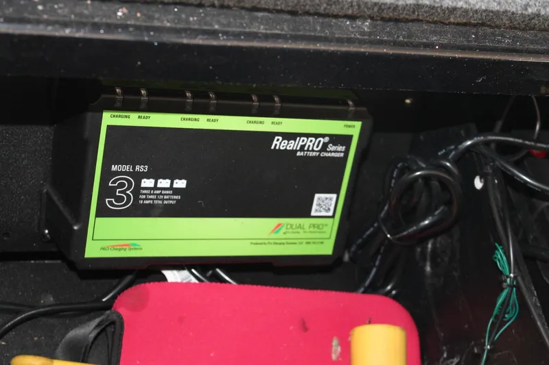 Slide: The Image of RealPRO Series RS3 battery charger in a 2020 Ranger Z185 boat. - 17