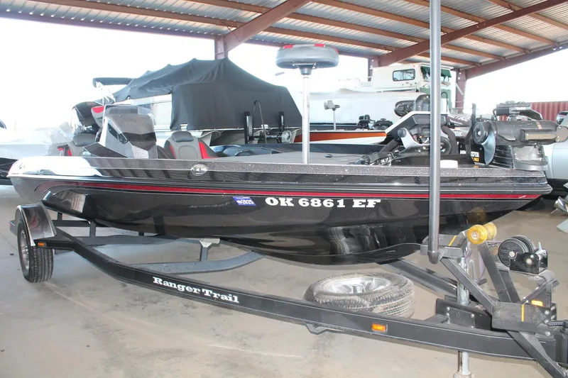 Slide: The Image of 2020 Ranger Z185 boat on trailer in covered storage area. - 2