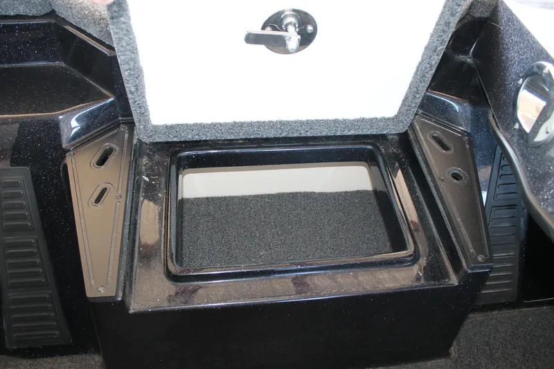 Slide: The Image of Open storage compartment in a 2020 Ranger Z185 boat. - 29