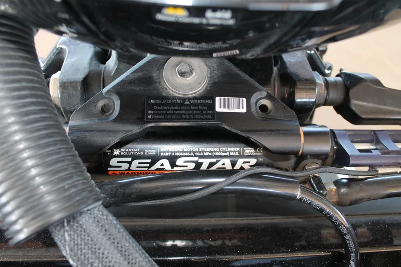 Slide: The Image of Close-up of SeaStar outboard motor steering cylinder on 2020 Ranger Z185 boat. - 32