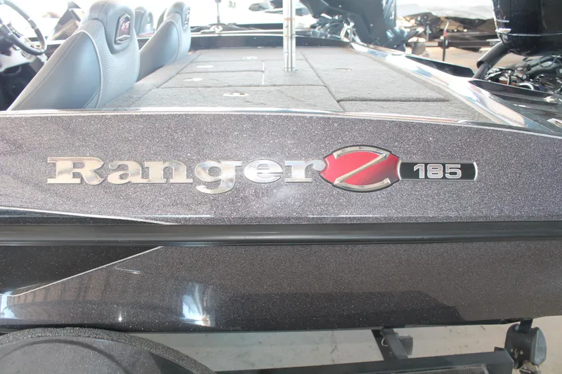 Slide: The Image of 2020 Ranger Z185 boat, close-up of logo and seating area. - 6