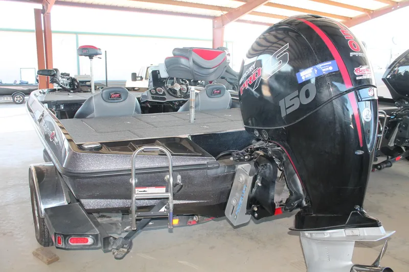 Slide: The Image of 2020 Ranger Z185 boat with Mercury 150 Pro XS engine in a garage. - 7