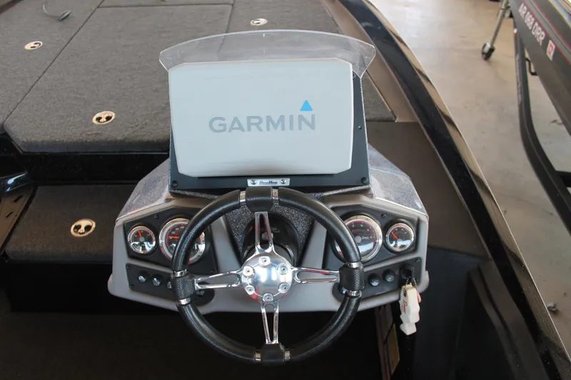 Slide: The Image of 2020 Ranger Z185 boat dashboard with Garmin navigation system and steering wheel. - 8