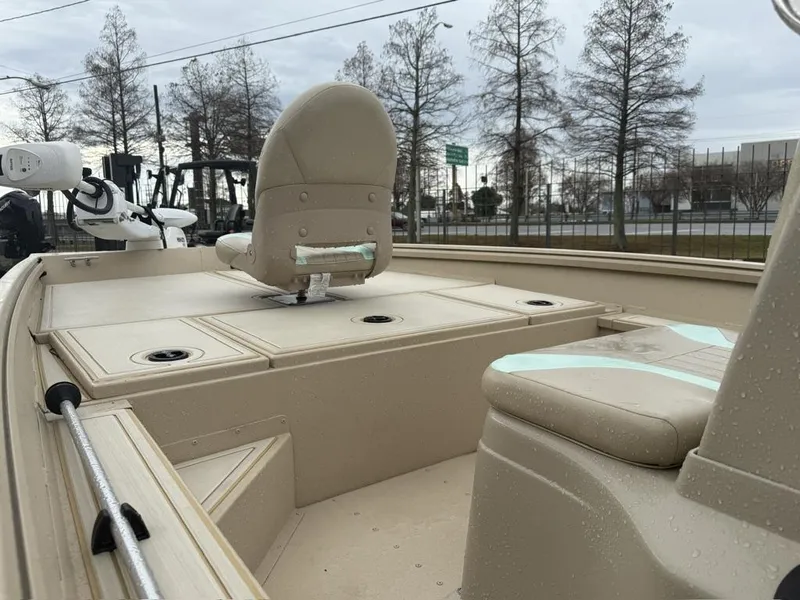 Slide: The Image of 2021 G3 17 BAY boat interior with seating and storage compartments. - 13
