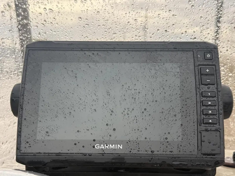 Slide: The Image of Garmin device on a rainy day, mounted on a 2021 G3 17 BAY boat. - 15