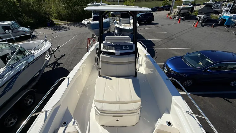 Slide: The Image of 2025 Boston Whaler 250 Dauntless boat in parking lot, top view. - 3