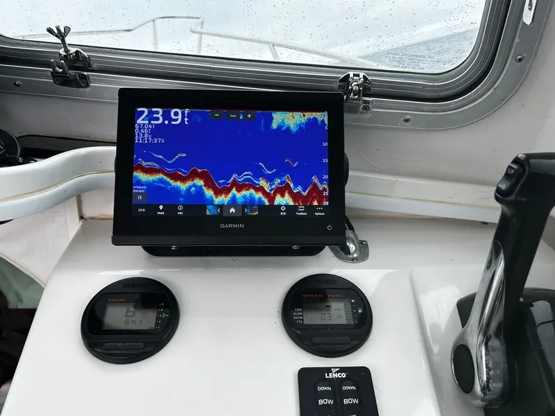 Slide: The Image of Dashboard of 2014 Steiger Craft 21 DV MIAMI with Garmin fishfinder display. - 12