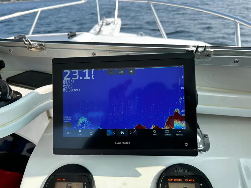 Slide: The Image of Garmin fishfinder on 2014 Steiger Craft 21 DV MIAMI boat, displaying depth and underwater terrain. - 13