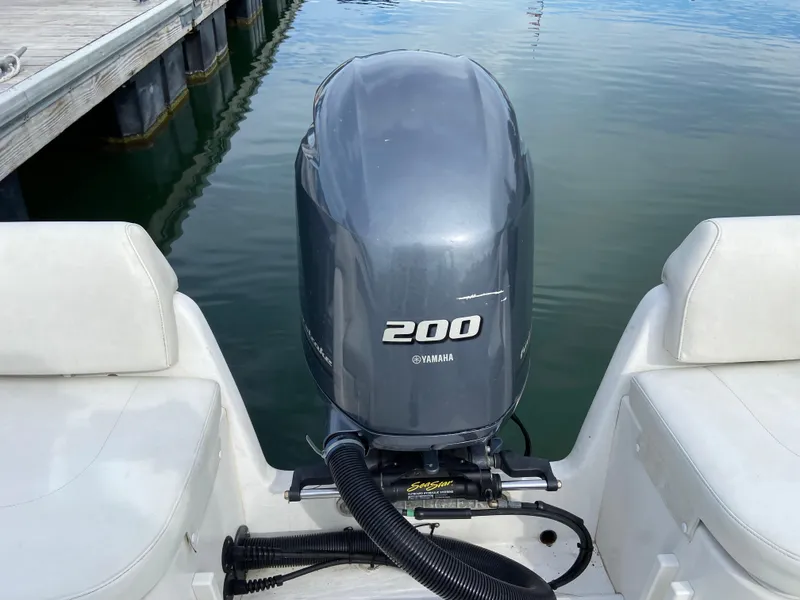 Slide: The Image of 2014 Steiger Craft 21 DV MIAMI with Yamaha 200 outboard engine at dock. - 16