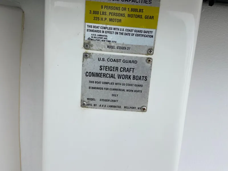 Slide: The Image of U.S. Coast Guard compliance plate on 2014 Steiger Craft 21 DV MIAMI commercial work boat. - 21