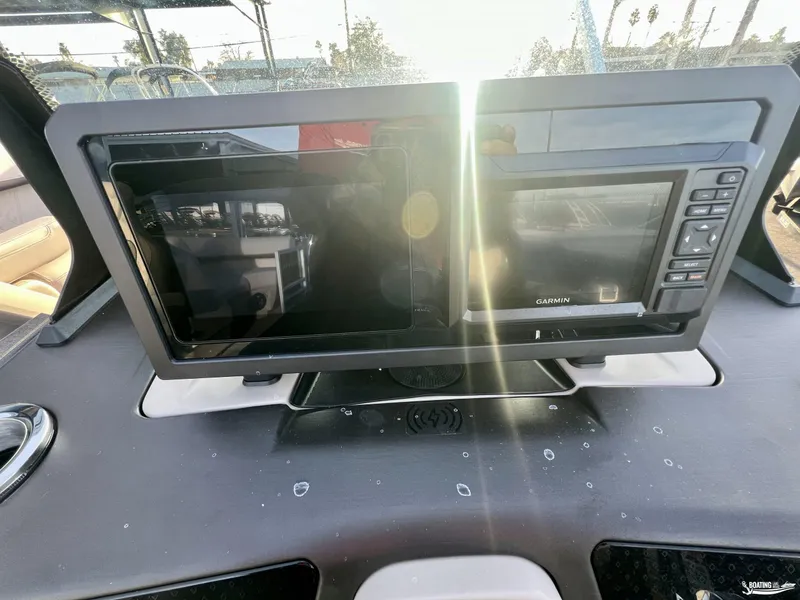 Slide: The Image of Dashboard of 2025 Bennington M22 with Garmin navigation system. - 9