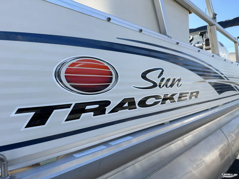 Slide: The Image of 2005 Sun Tracker PARTY BARGE 25 pontoon boat side view with logo. - 6