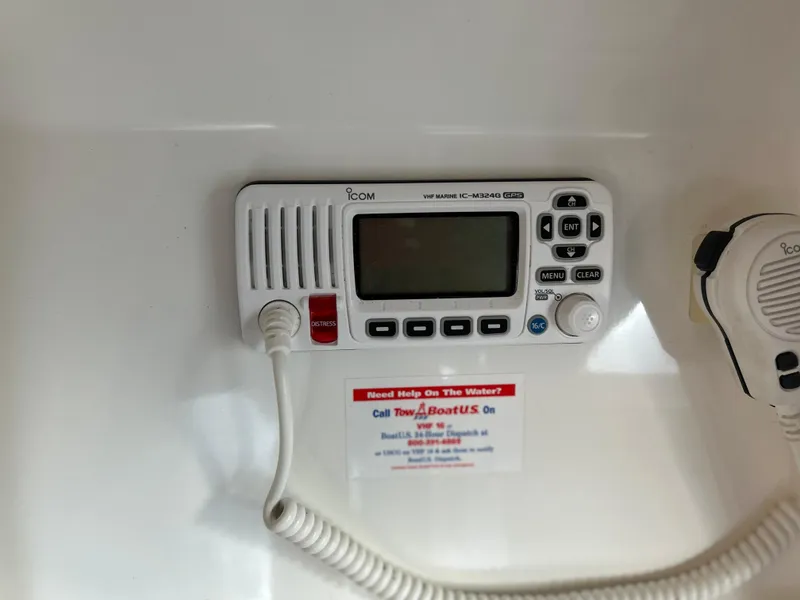 Slide: The Image of VHF marine radio on 1999 Grand Banks Classic boat dashboard. - 29