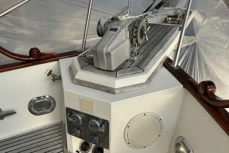 Slide: The Image of 1999 Grand Banks Classic yacht deck with winch and control panel. - 36