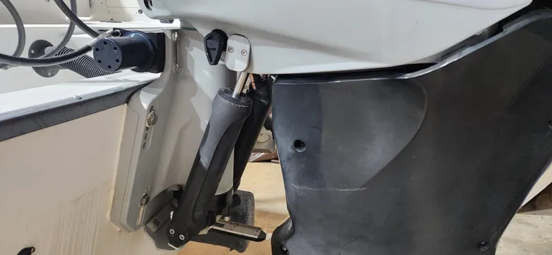 Slide: The Image of Close-up of a 1999 Boston Whaler 23 Outrage boat engine component. - 16